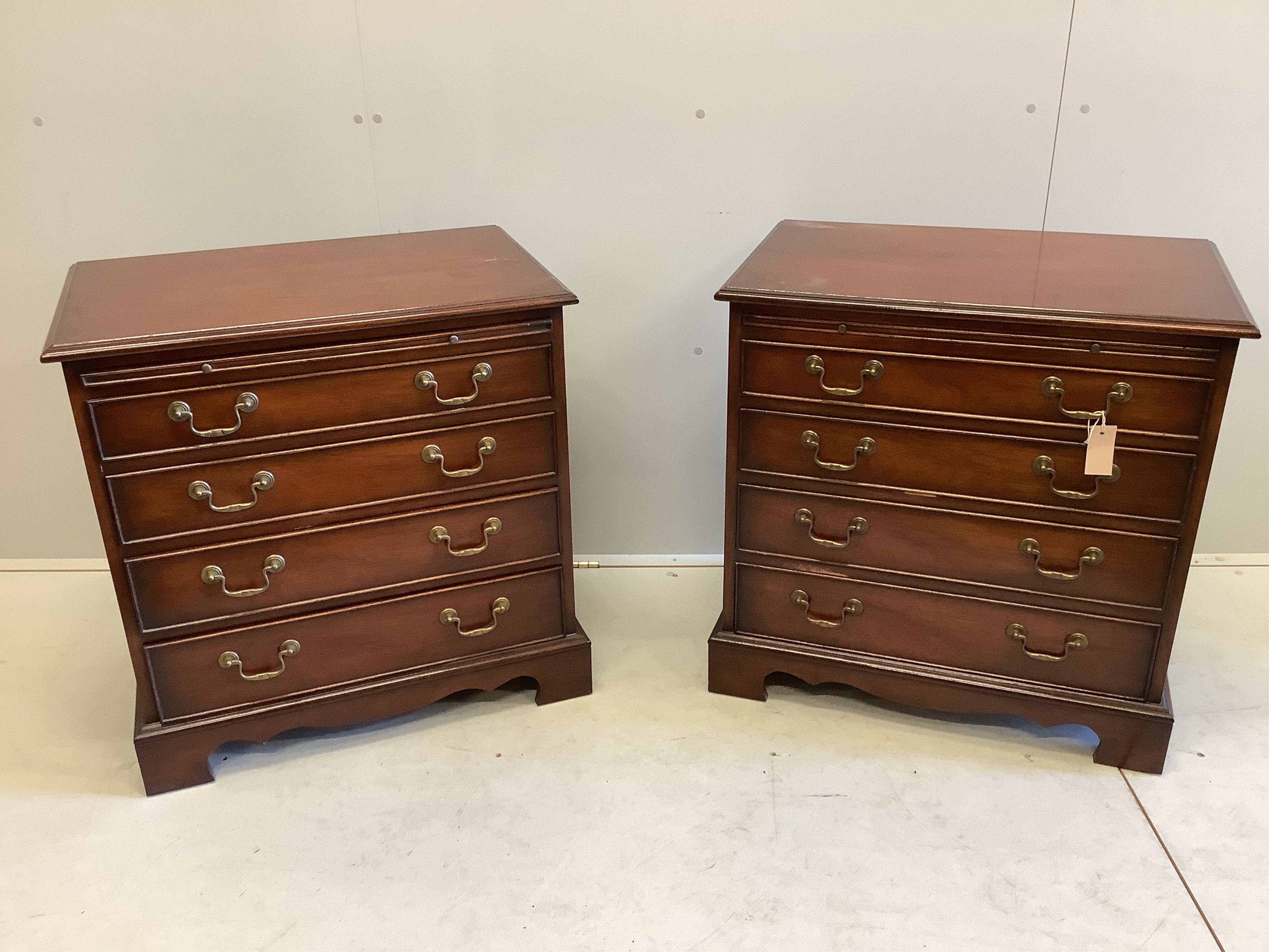 A pair of Georgian style mahogany bedside chests, each fitted four drawers and a slide, on square bracket feet, width 71cm, depth 46cm, height 71cm